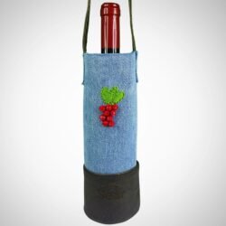 Front view of a handcrafted denim wine bag by Sear Handcrafted Elegance, holding a 750ml wine bottle. Features a leather strap, embroidered grapes, and a rustic leather base. Ideal for gifting wine lovers.