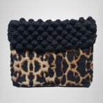 Sear Handcrafted Elegance brand handmade leopard print black crochet clutch bag, front view. Elegant and stylish design, perfect accessory for daily use or special occasions.