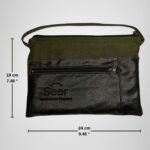 Green and black leather handbag by Sear Handcrafted Elegance, front view, with dimensions: 24 cm (9.45 inches) wide and 19 cm (7.48 inches) tall. Features a front pocket and modern design.