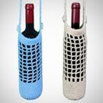 Blue and beige handmade crochet wine bottle bag, made from certified organic cotton by Sear Handcrafted Elegance. Elegant and eco-friendly design, perfect for gifting wine.