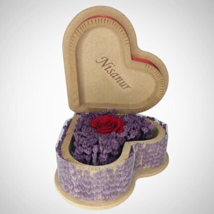 Heart-shaped wooden box with an everlasting red rose and real lavender, personalized with "Nisanur" on the lid, perfect for a romantic gift.