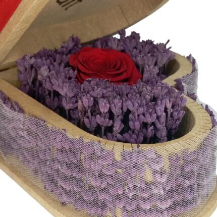 Close-up of a heart-shaped wooden box with an everlasting red rose and lavender, personalized with "Nisanur," a romantic gift
