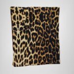 Back view of a leopard print book organizer bag, showcasing a sleek and stylish design.