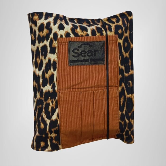 Leopard print book organizer bag with brown fabric pockets and Sear Handcrafted Elegance brand label, front view.