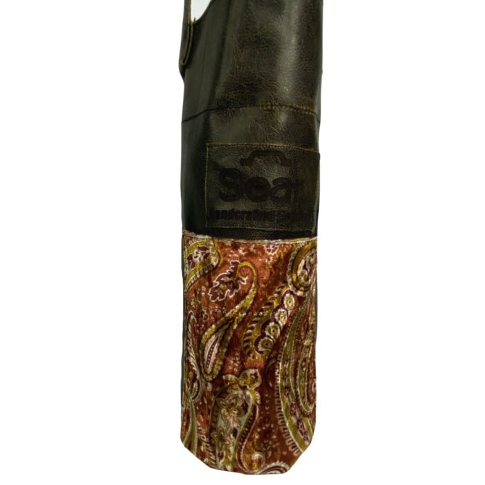 Handmade paisley wine bag with leather detail and Sear Handcrafted Elegance branding on a white background.
